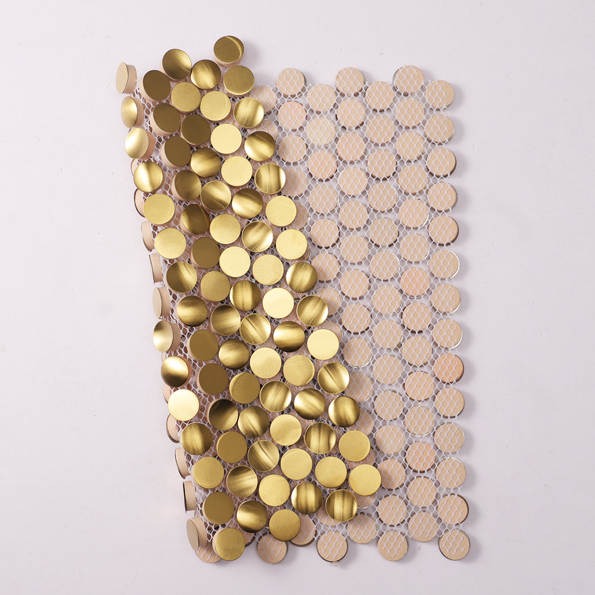 Folded back side of 3D gold penny rounds brushed stainless steel mosaic tiles