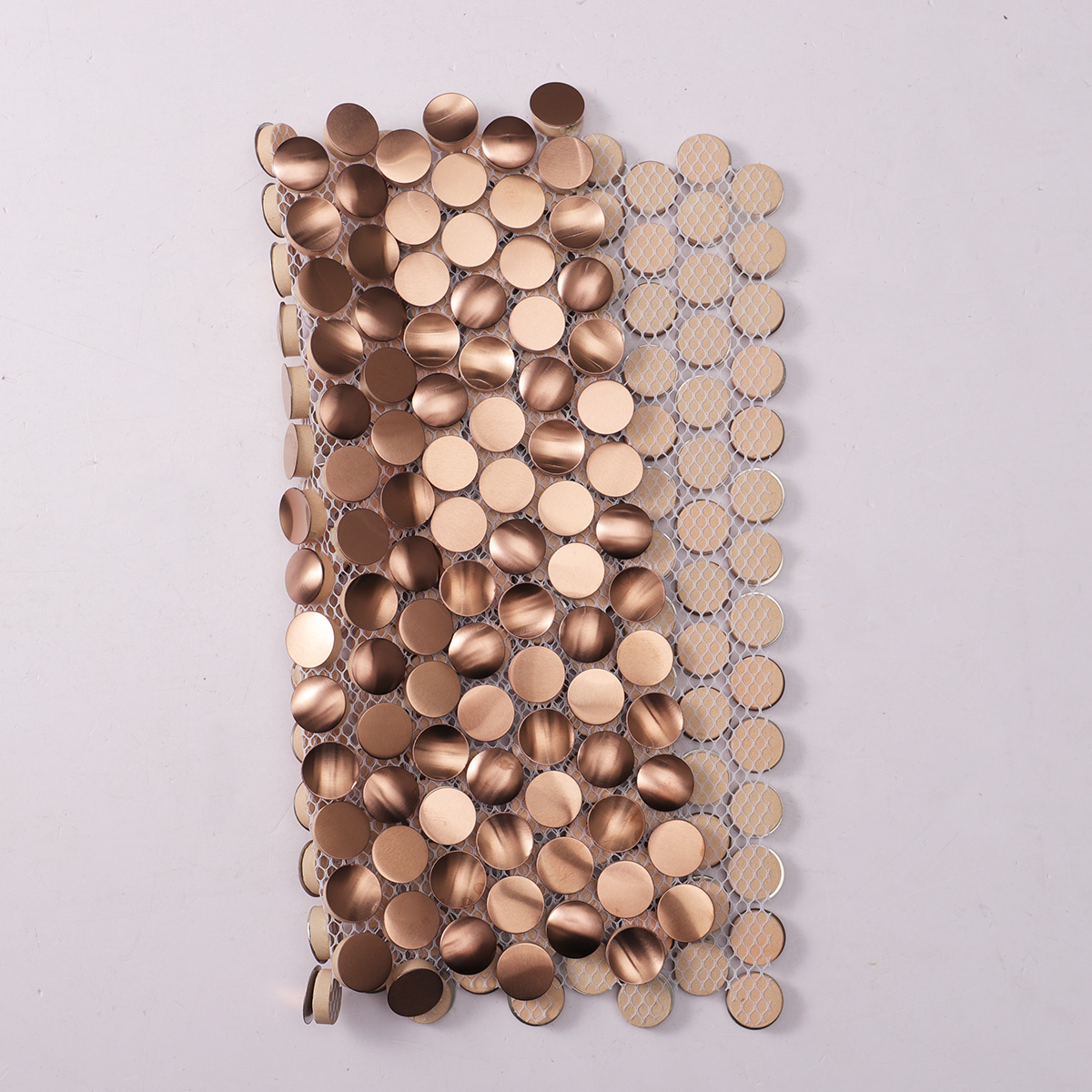Folded back side of penny rounds rose gold 3D stainless steel mosaic tiles.
