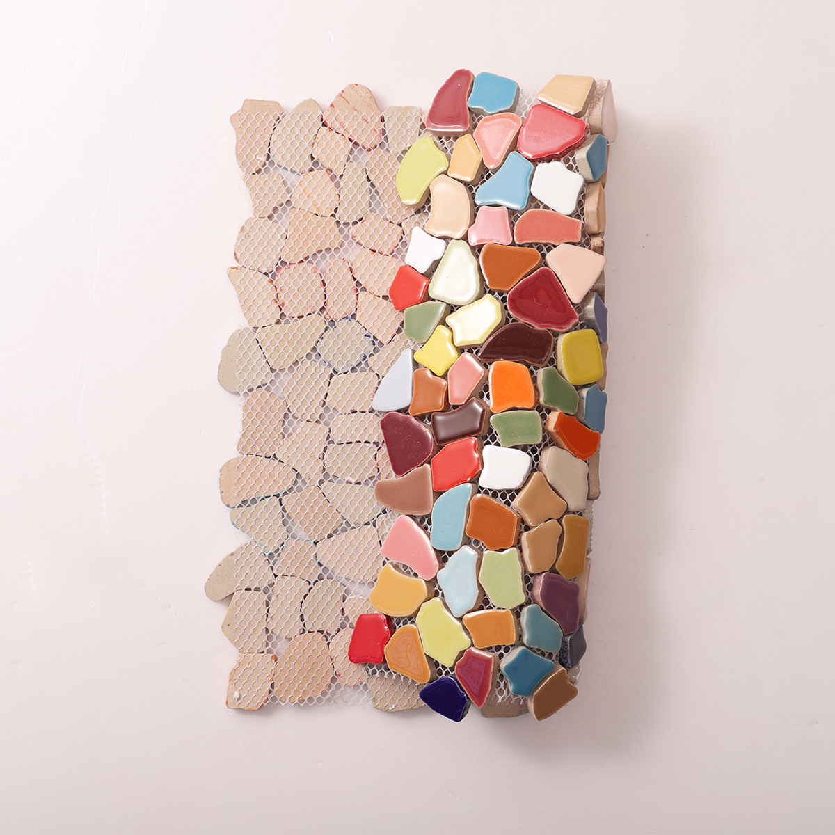 Back side of colorful broken ceramic mosaic tiles
