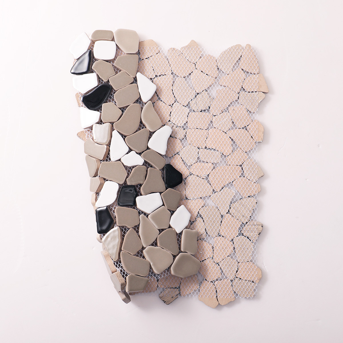 Folded back side of glossy grey ceramic cracked mosaic tiles