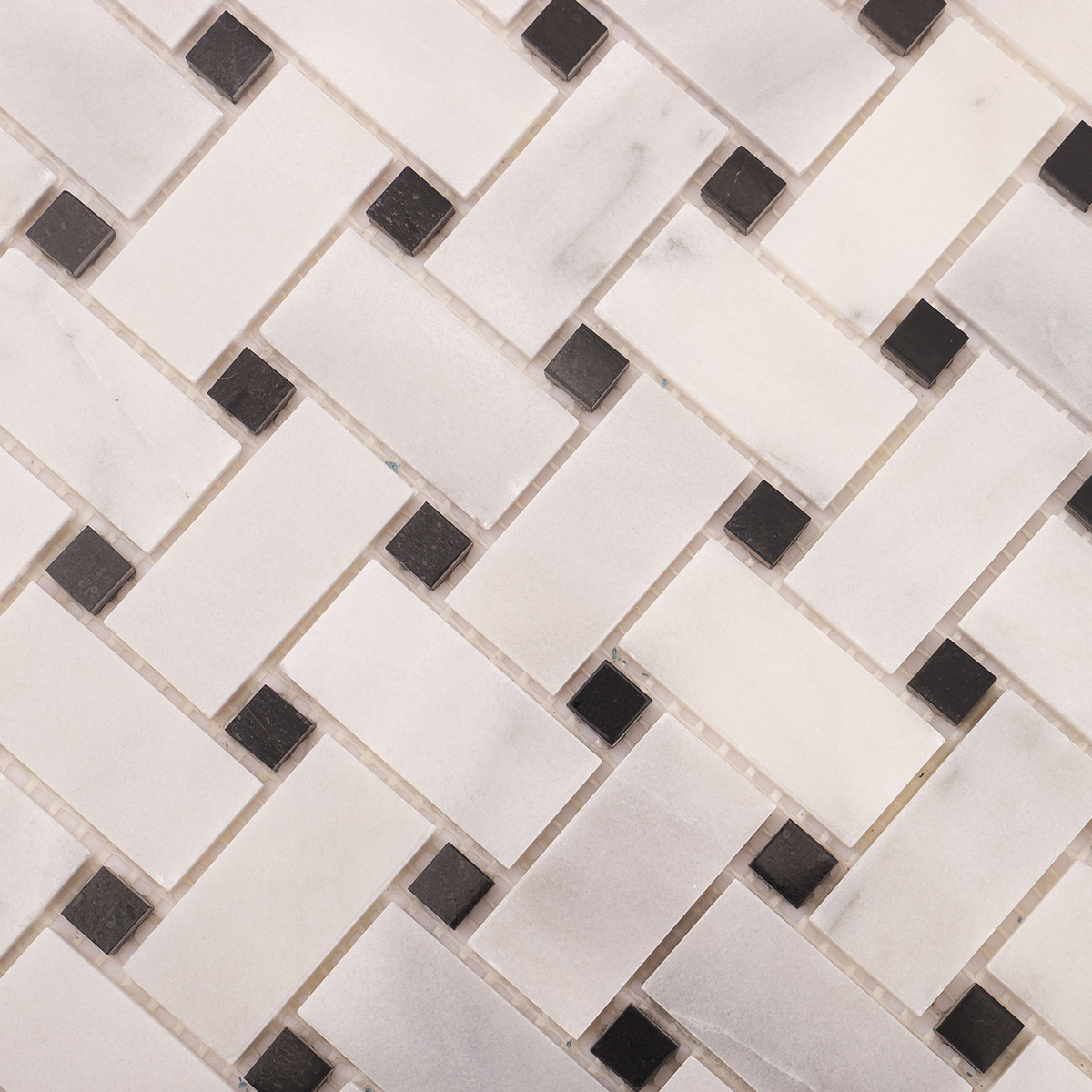 Detailed close-up of Carrara white basketweave marble mosaic tiles