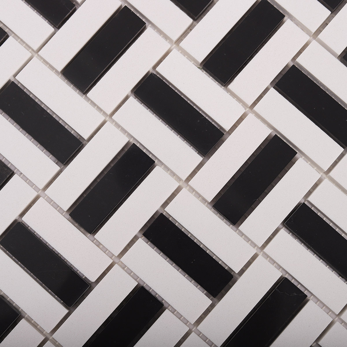 Detailed close-up of black and white faux marble mosaic tiles