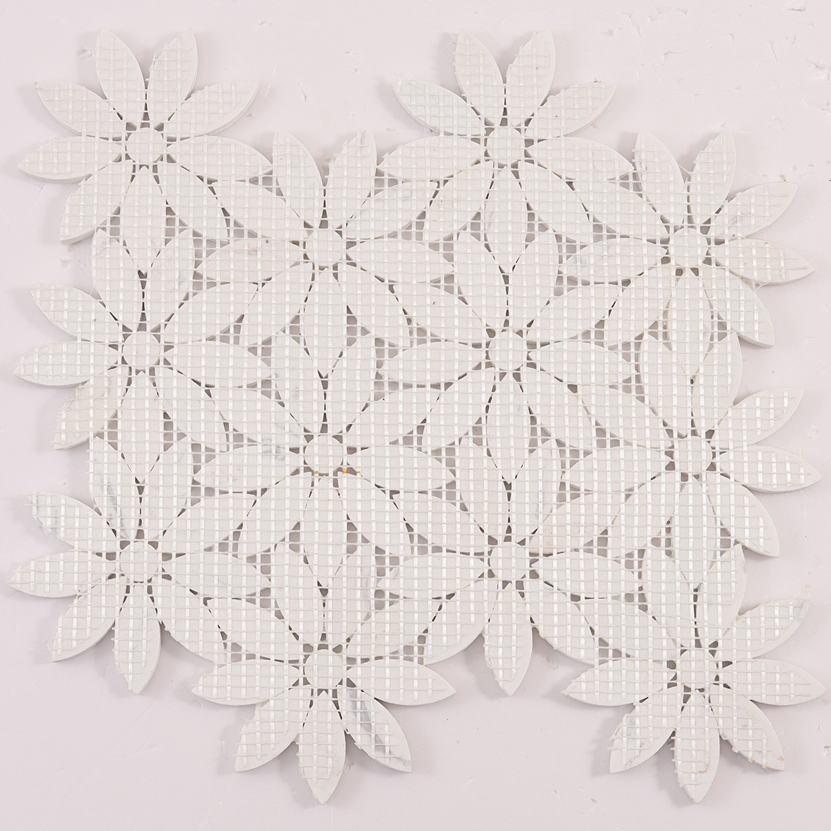 Back side of white daisy waterjet marble mosaic tiles