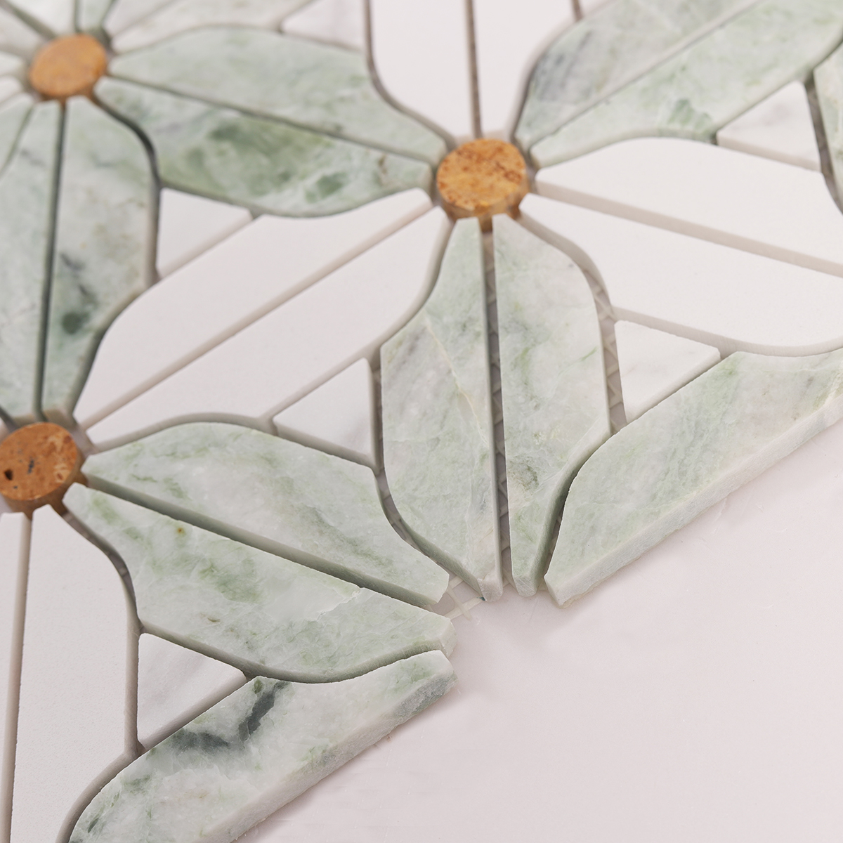 Side close-up view of black and white flower marble mosaic tiles, showing texture and thickness