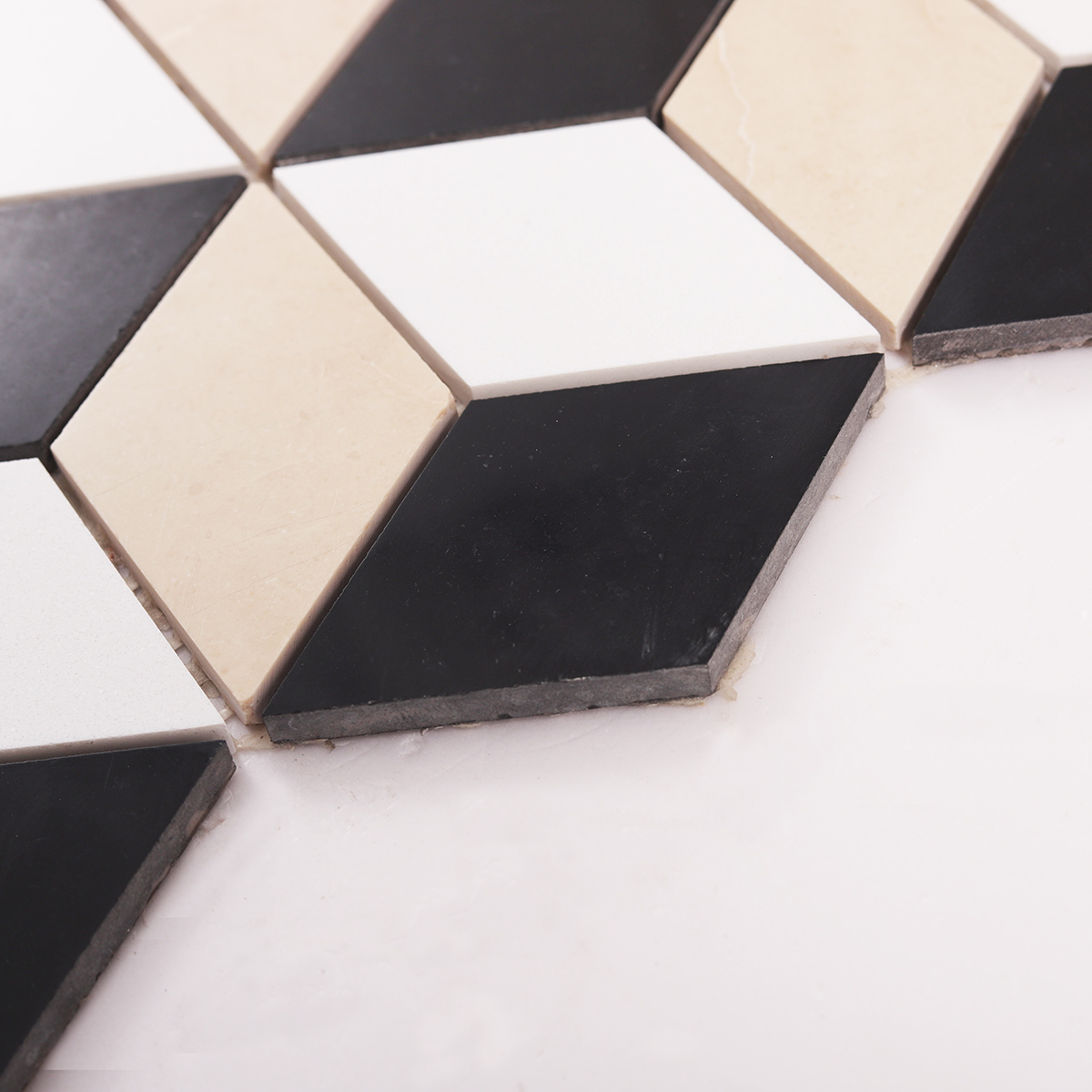 Side close-up view of diamond cubemarble mosaic tiles, showing texture and thickness