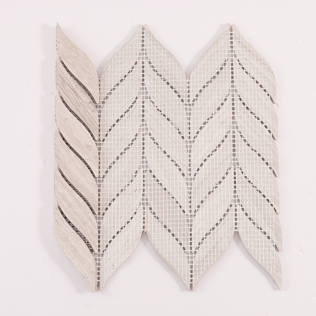 Folded back side of Grigio Legno leaf shape marble mosaic tiles.