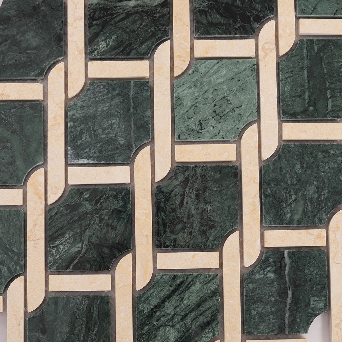 Macro close-up of Rockart Medallion Green polished marble mosaic tiles