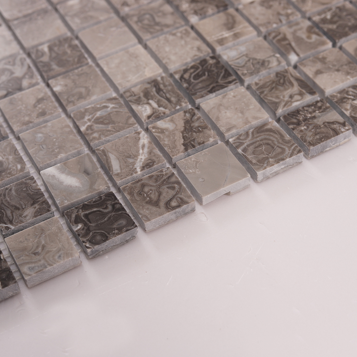 Side close-up view of Emperador Light Brown Square Marble Mosaic Tiles, showing thickness.