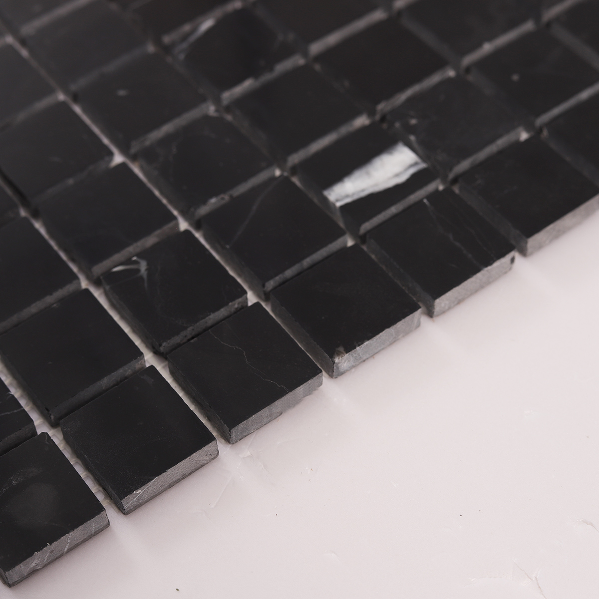 Side close-up view of Nero Marquina Square Black Polished Marble Mosaic Tiles