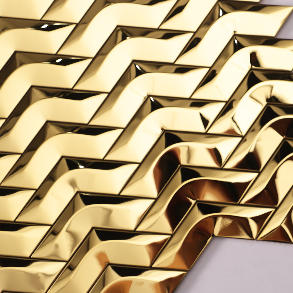 Detailed view of 3D Gold Herringbone Mirror Stainless Steel Mosaic Tile