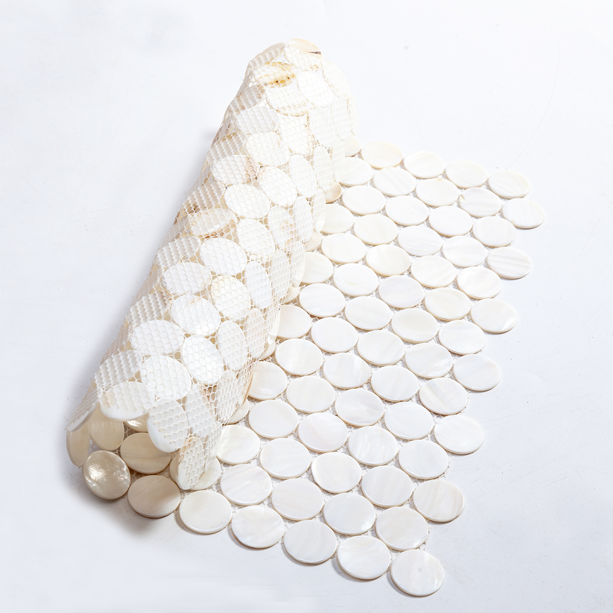 Penny White Natural Pearl Shell Mosaic Tile, back side with fold visible