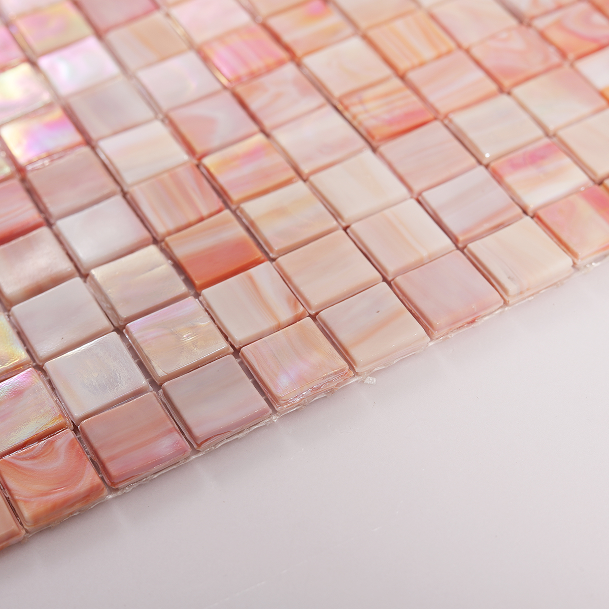 Side view close-up of Pink Polished Glass Mosaic Floor Tiles, edge detail