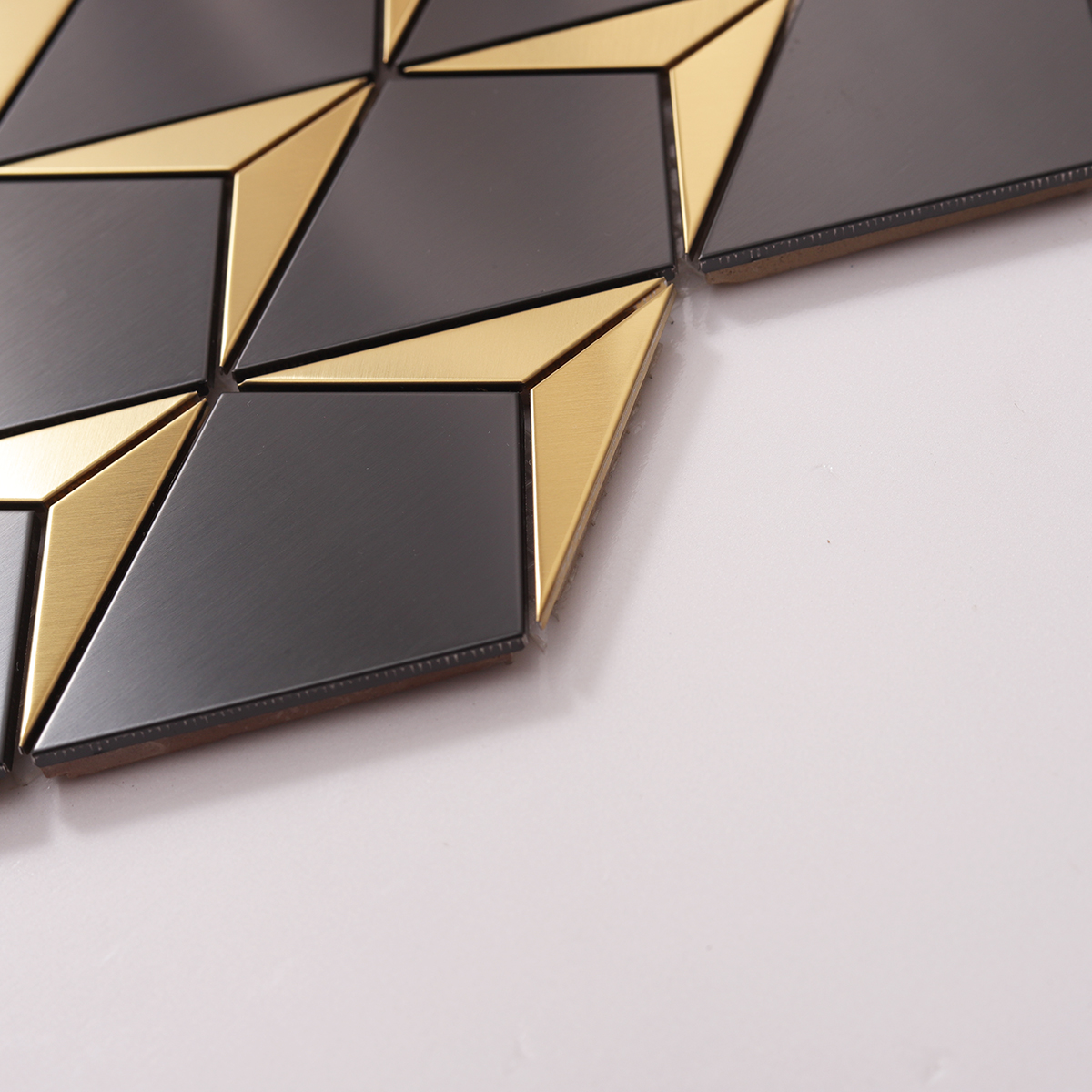  Side view close-up of Black and Gold Diamond Metal Mosaic Tile, sharp edge detail