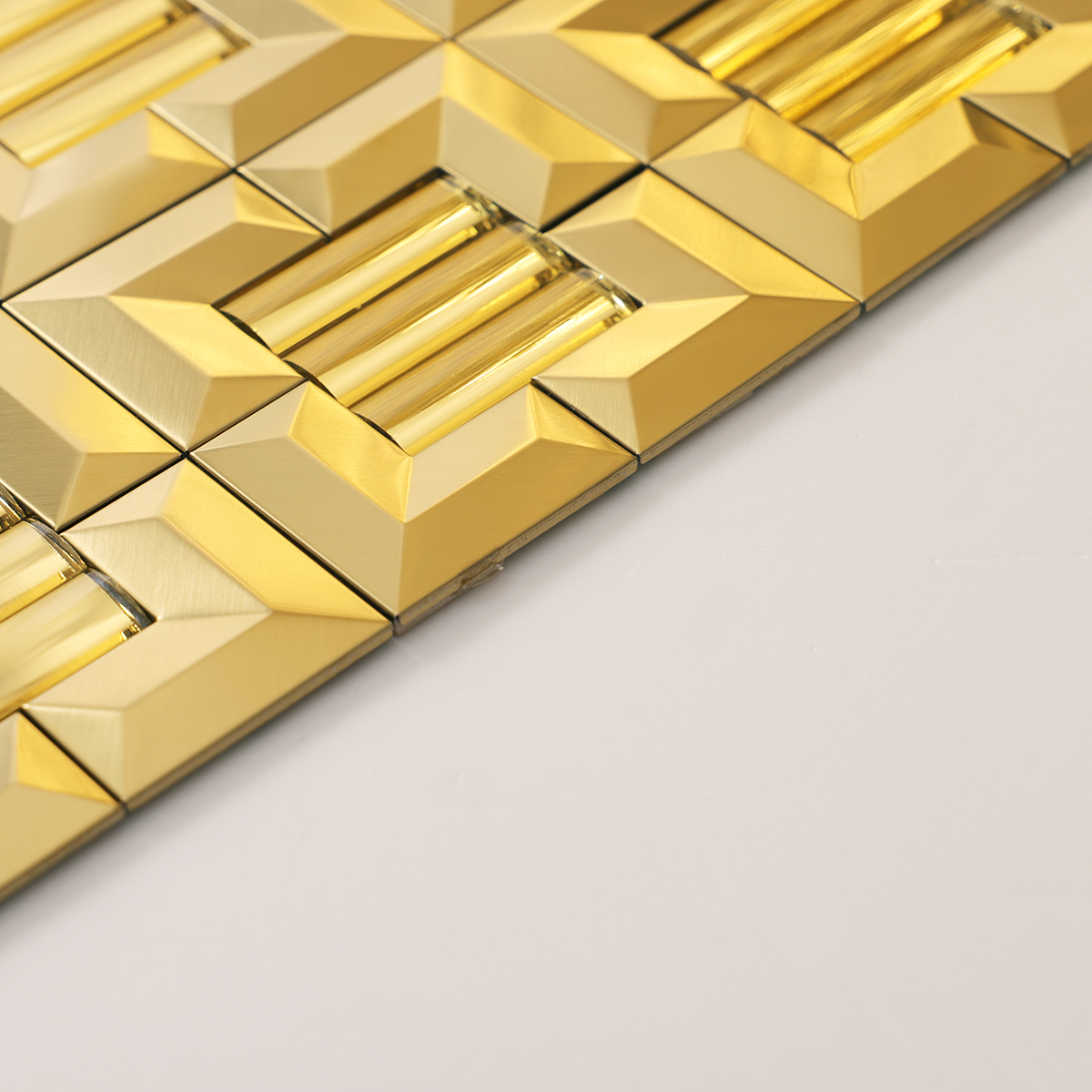 Side view close-up of Glass Mix Metal Gold 3D Mosaic Backsplash Tile, sharp edges