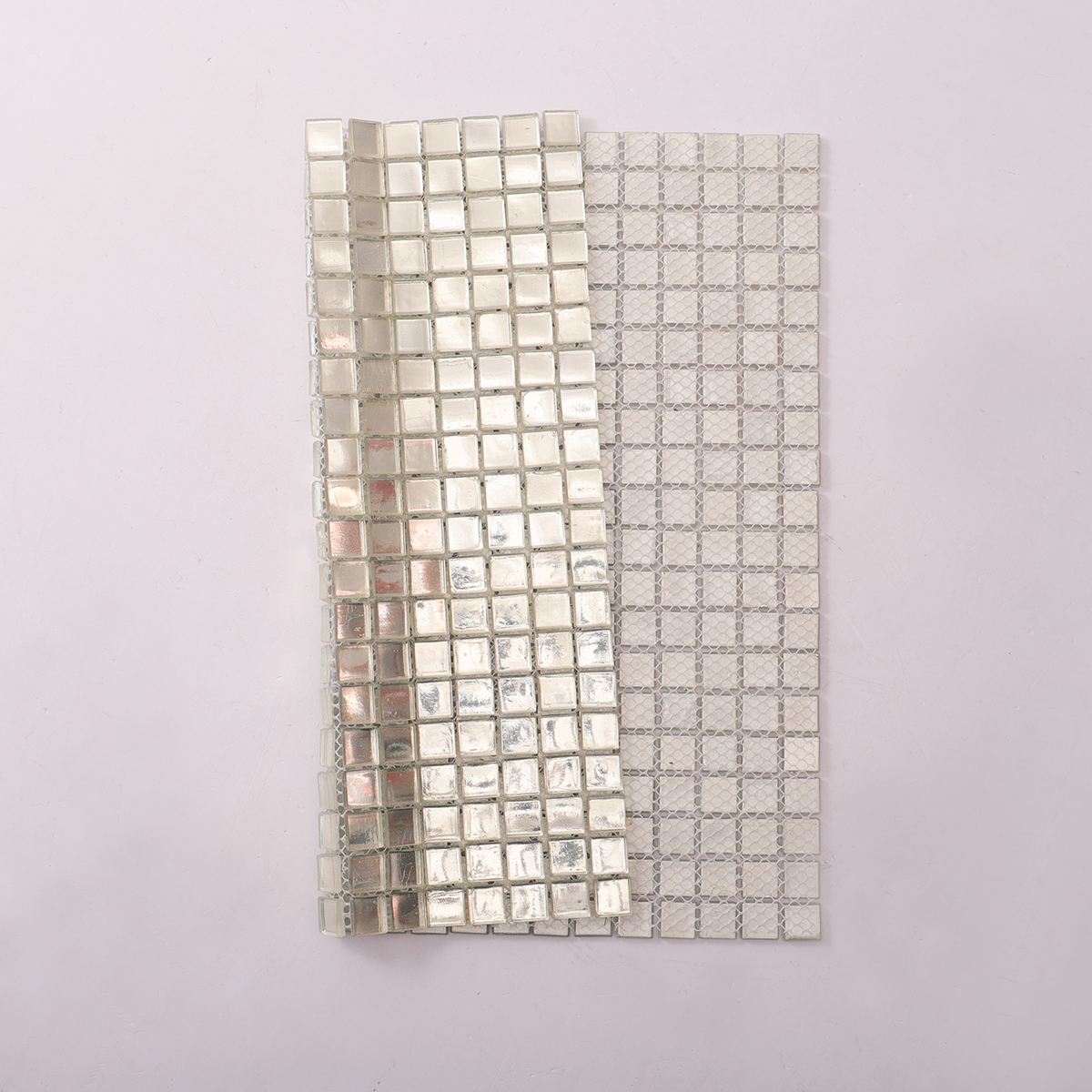 Silver Foil Square Glass Mosaic Wall Tile, back side with fold visible, sturdy and sleek