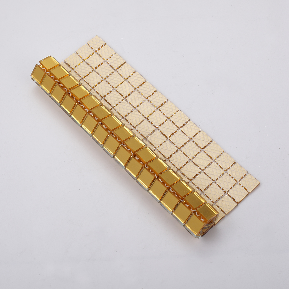 Golden Mirror Glass Square Mosaic Tiles, back side with fold visible, sturdy construction