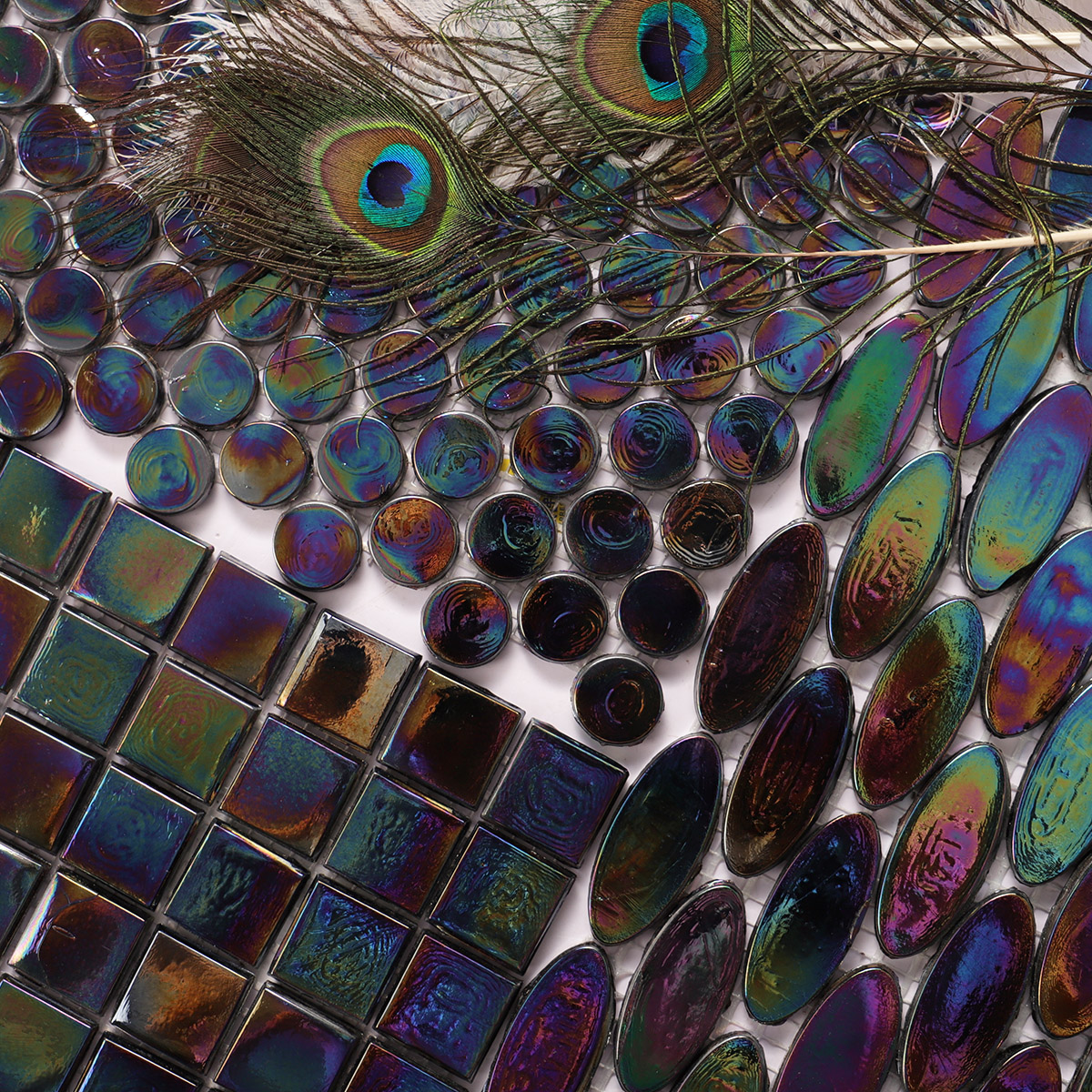 Black Square Iridescent Glass Mosaic Tile detail shown alongside round and oval mosaic tiles
