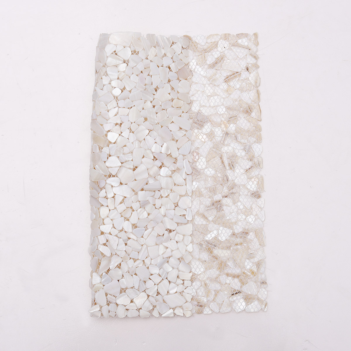 White Mother of Pearl Pebbles Mosaic Tiles, back side with fold visible