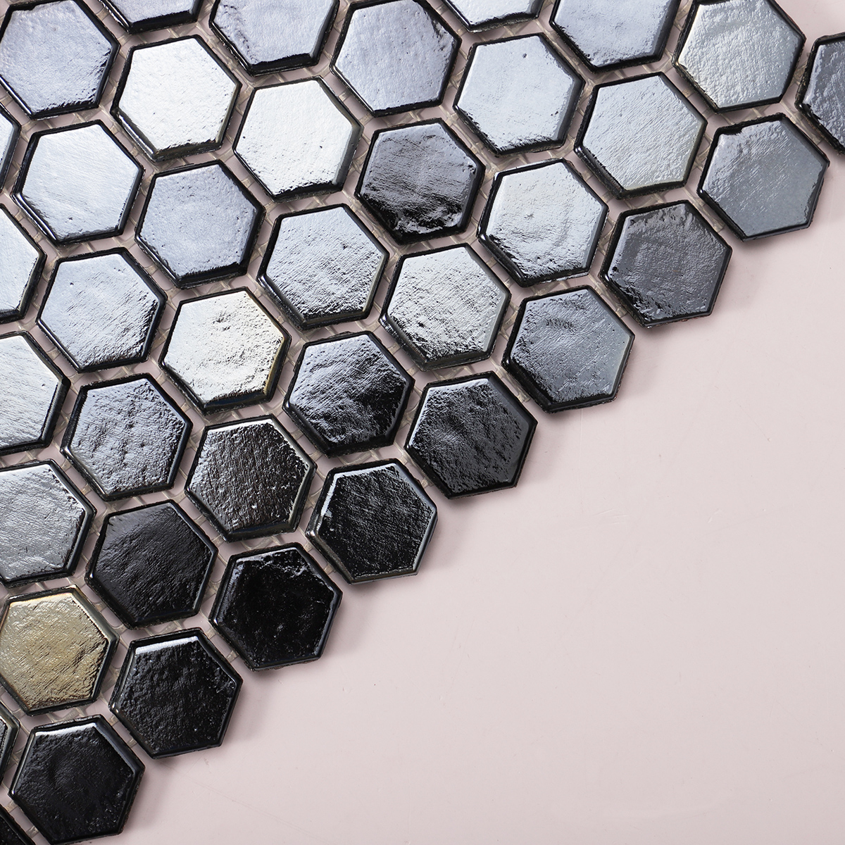 Side view close-up of Black Polished Honeycomb Glass Mosaic Floor Tile