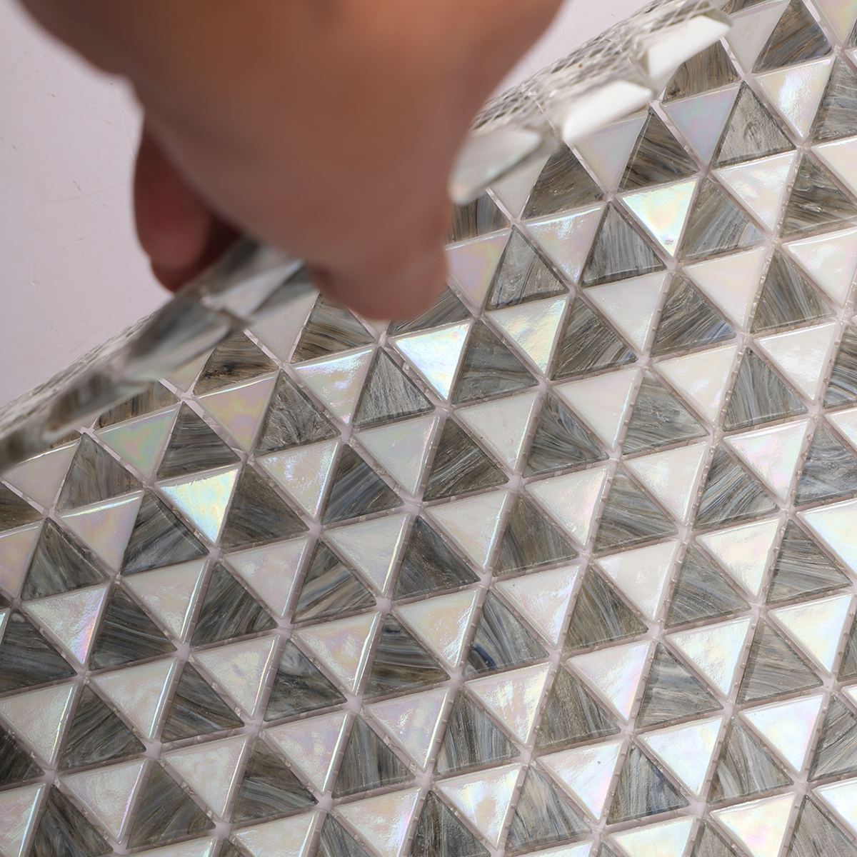  Close-up of Gray and White Glass Triangle Mosaic Tile
