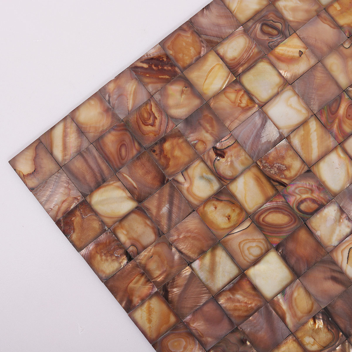 Close-up of Brown Square Mother of Pearl Shell Mosaic Tile Surface