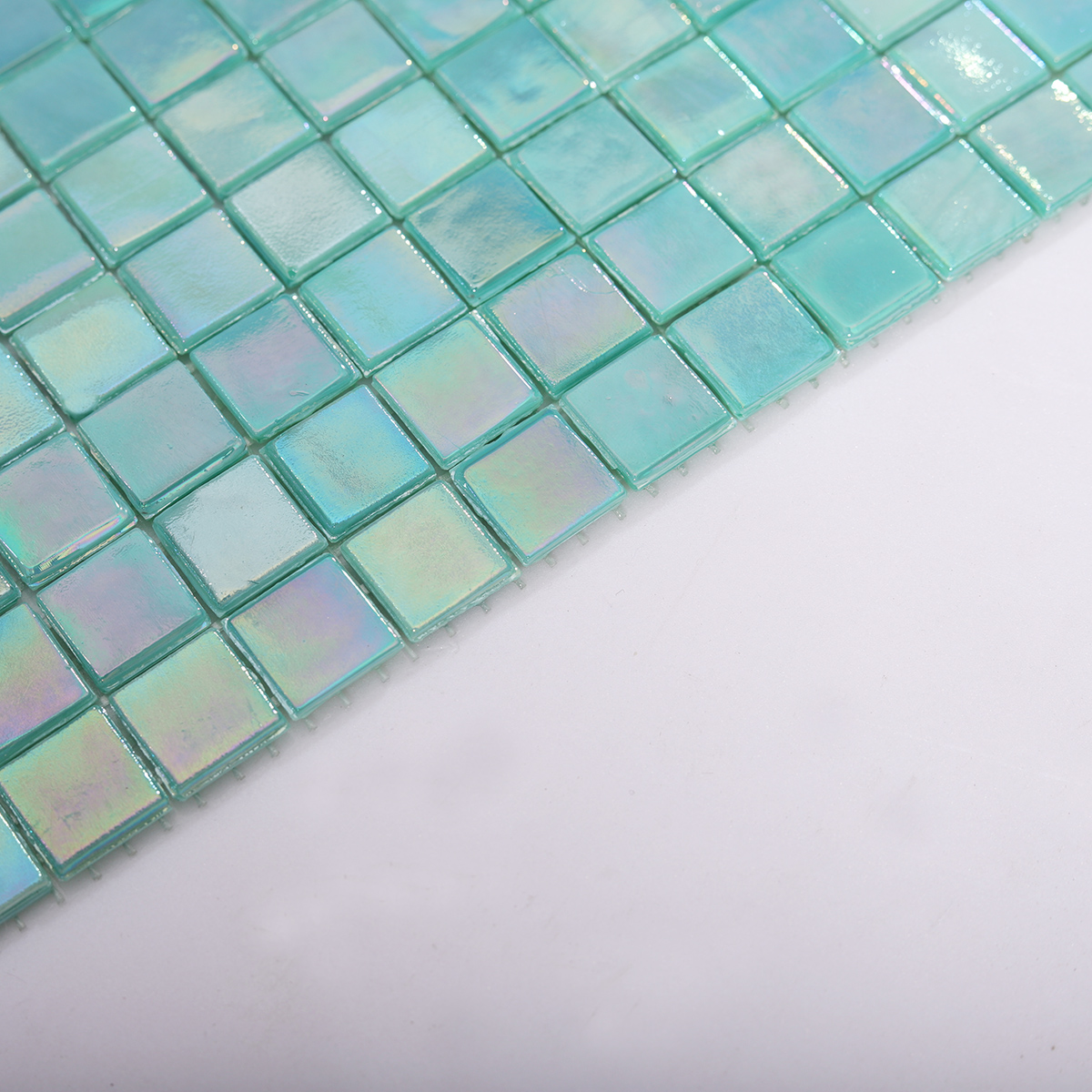 Side View Showing Thickness of Iridescent Blue Green Mosaic Pool Tile