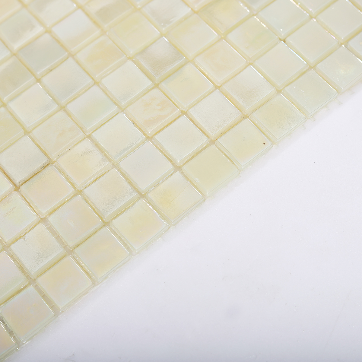 Side View Showing Thickness of Seafoam Green and Cream Glass Pool Tiles