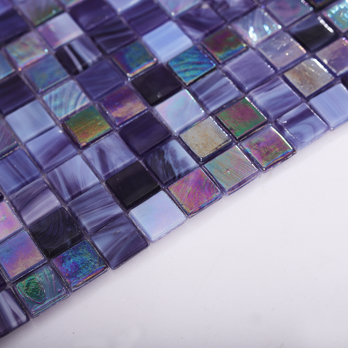 Side View Highlighting Thickness of Violet Iridescent Glass Mosaic Tiles