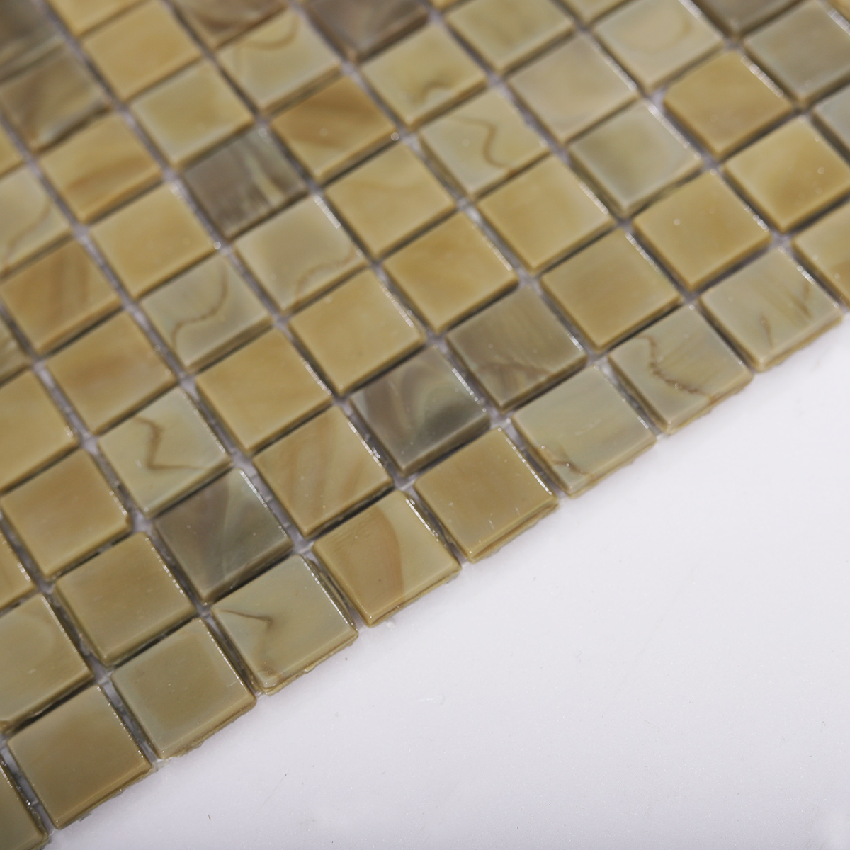 Side View Showing Thickness of Brown Glass Square Mosaic Tile