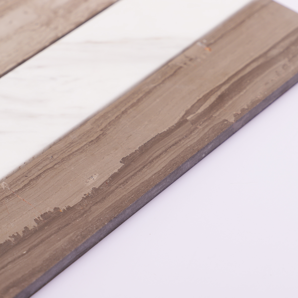 Side view of beige marble mosaic tiles to show thickness and edges