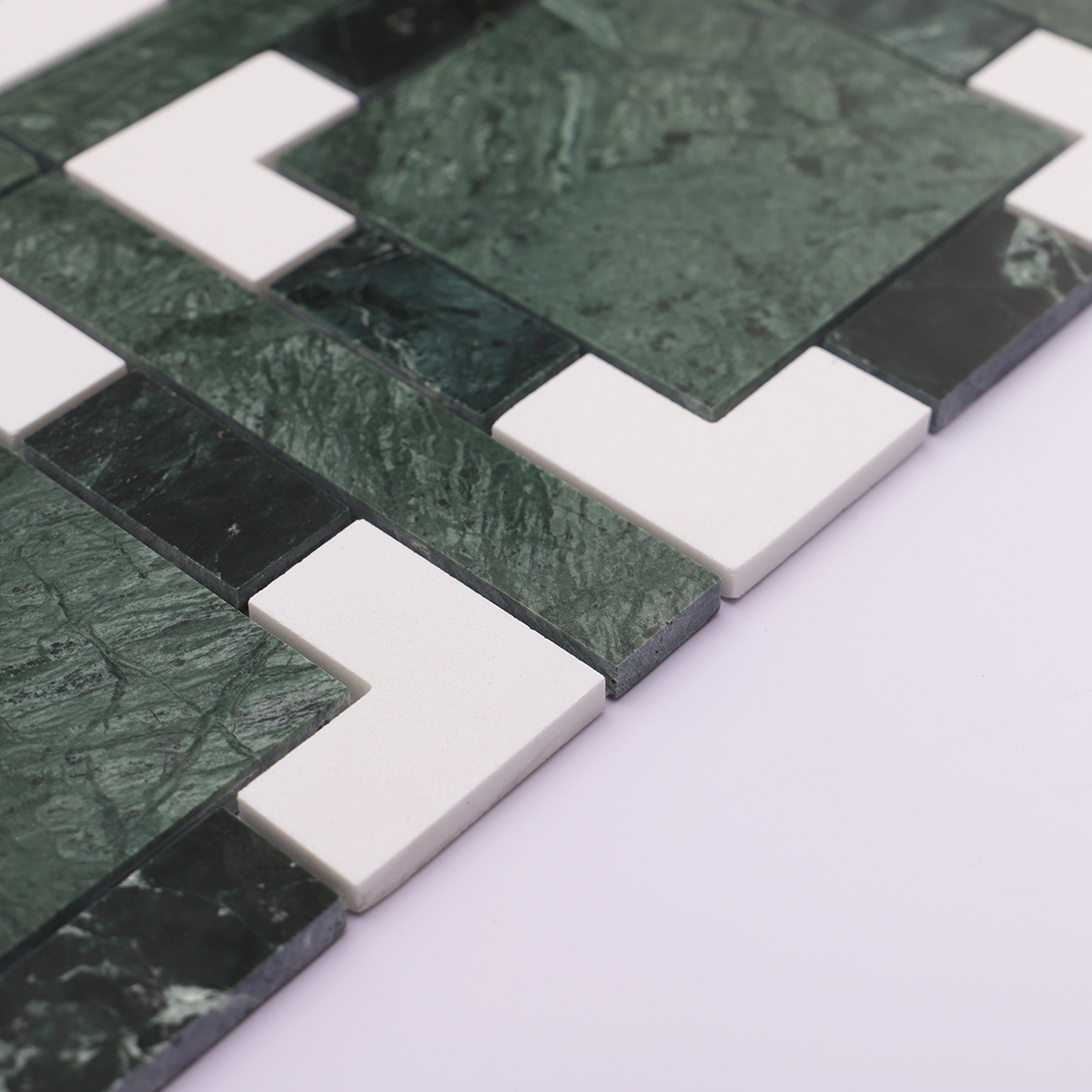 Side view of the stone mosaic tile highlighting its thickness and edge finish