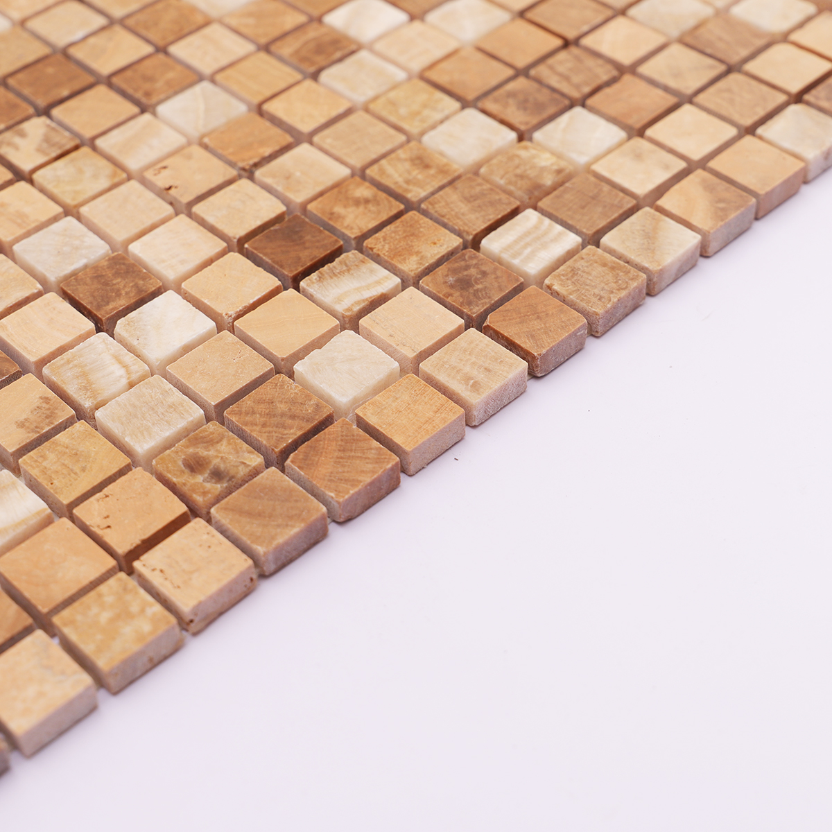 Side view showing the thickness of light brown square wooden marble mosaic tiles.