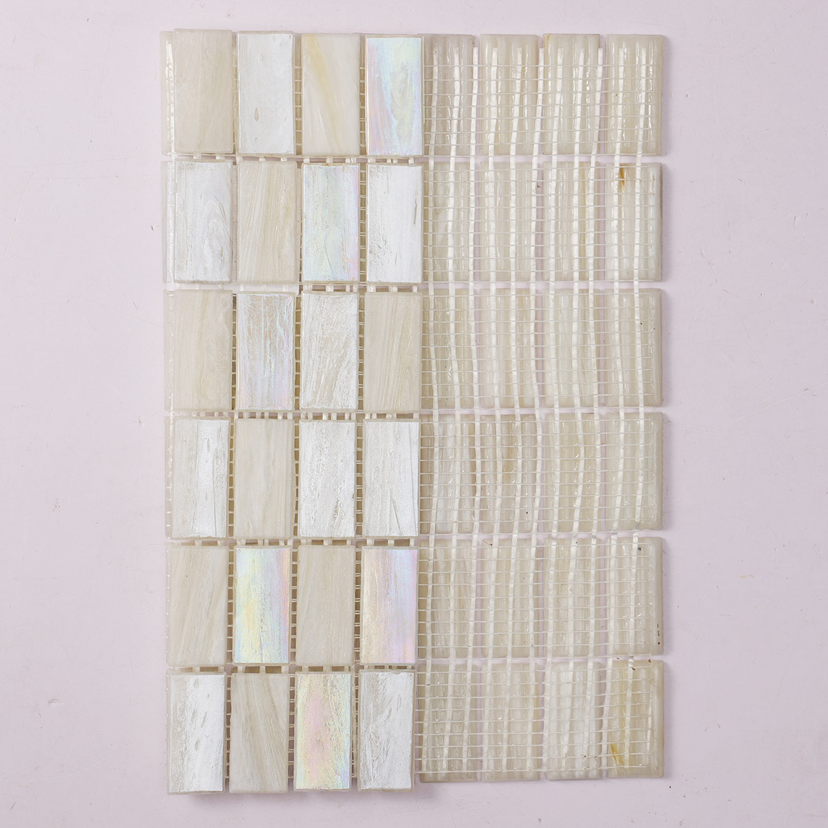 Back side of rectangle beige multicolor iridescent glass mosaic tiles, folded