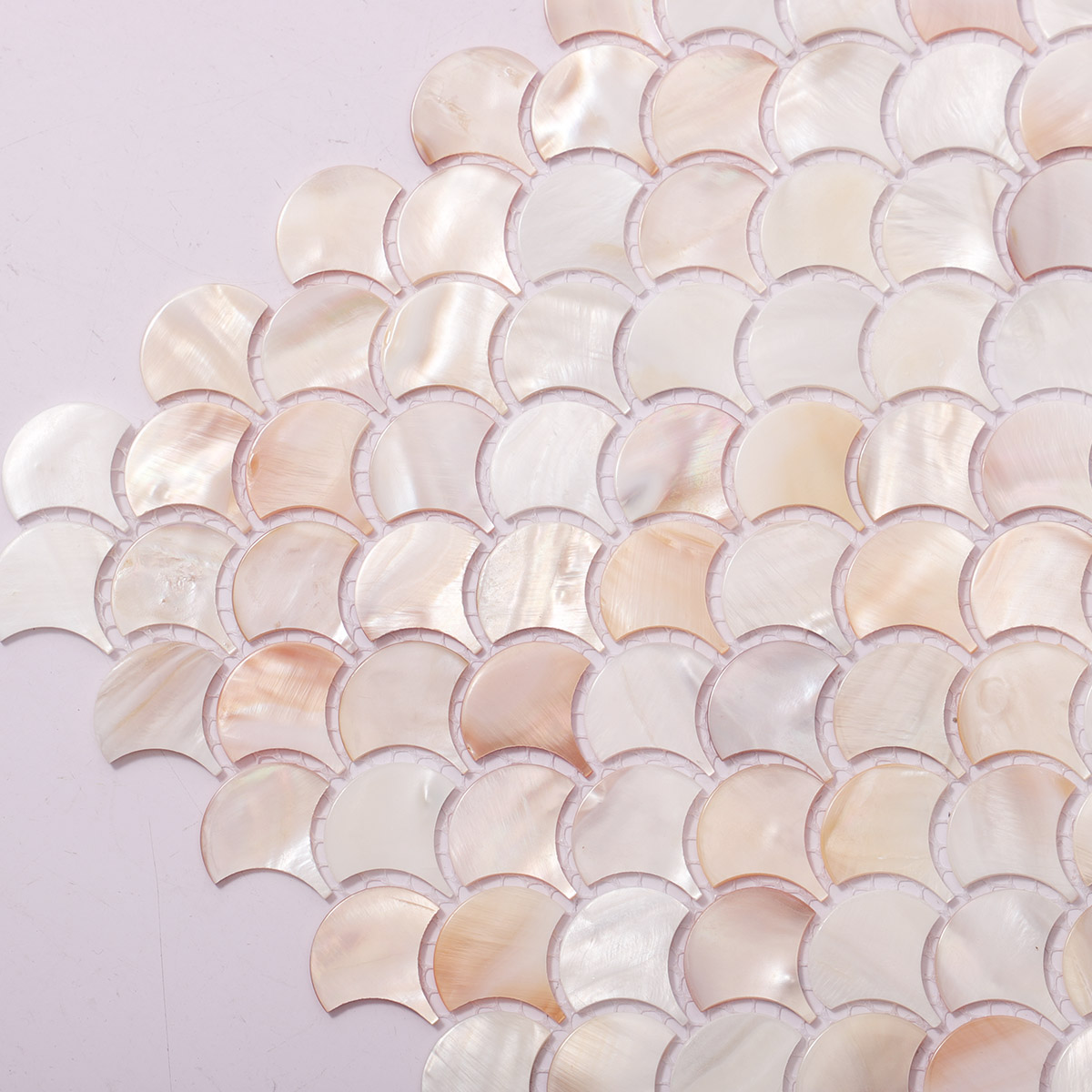 Close-up of natural white mother of pearl fish scale mosaic tiles