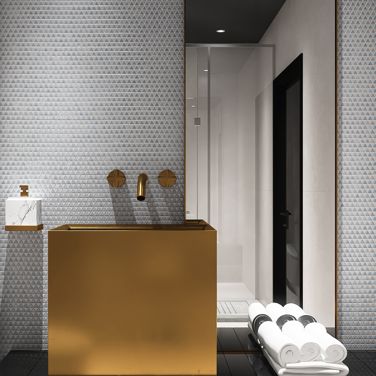 Blue and white checkerboard triangle glass mosaic tiles on bathroom wall.