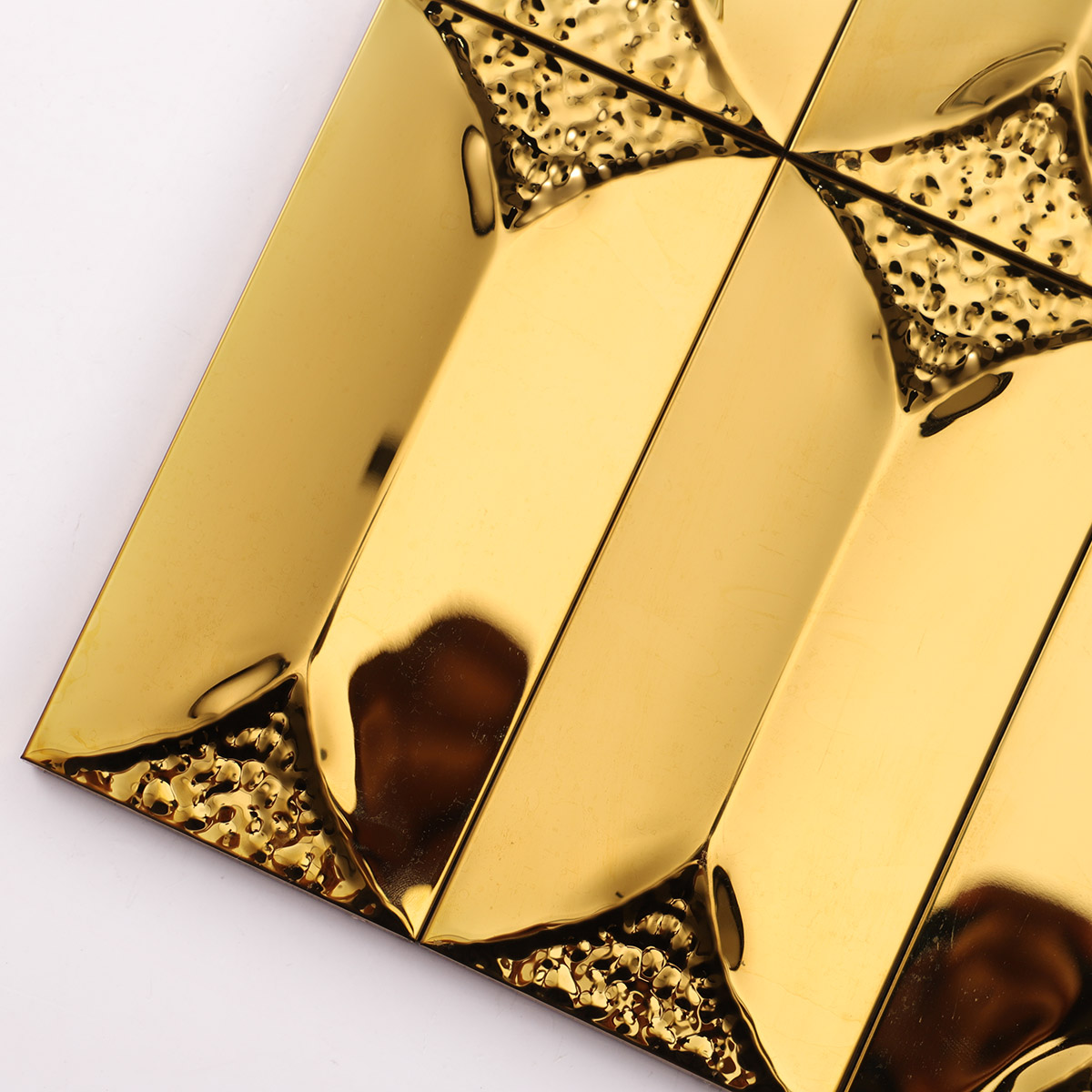 Close-up of gold rectangle 3D metal mosaic tile
