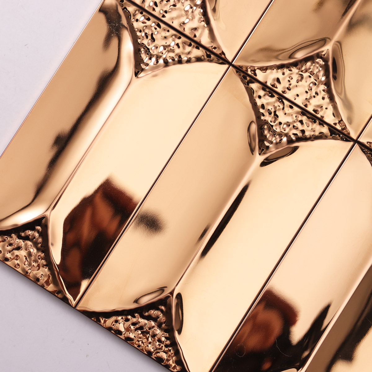Close-up of champagne gold metal mosaic tiles