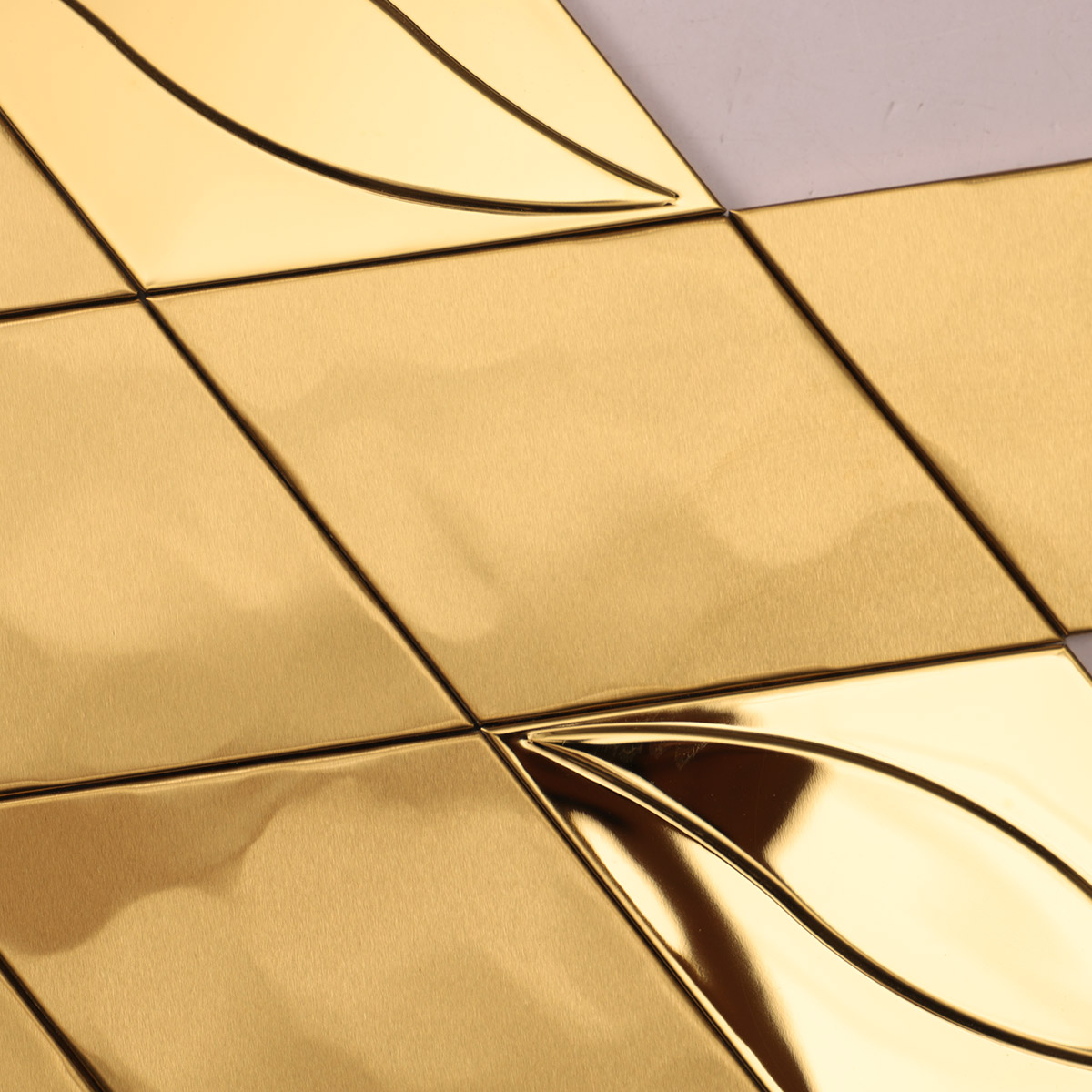 Close-up of the middle of 3D golden diamond stainless steel mosaic tiles