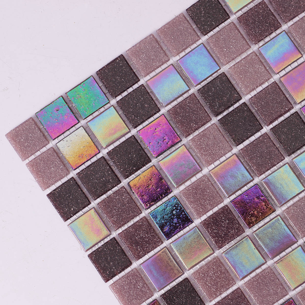 Close-up side view of purple uniform square glass mosaic tiles