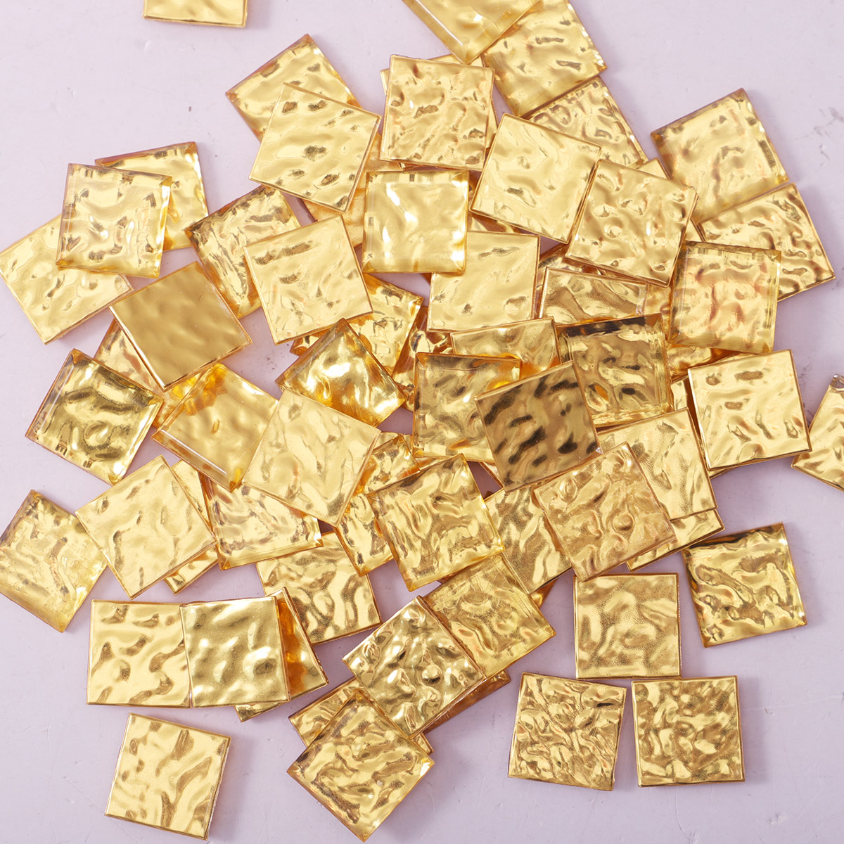 Close-up of 24kt gold glass mosaic tiles