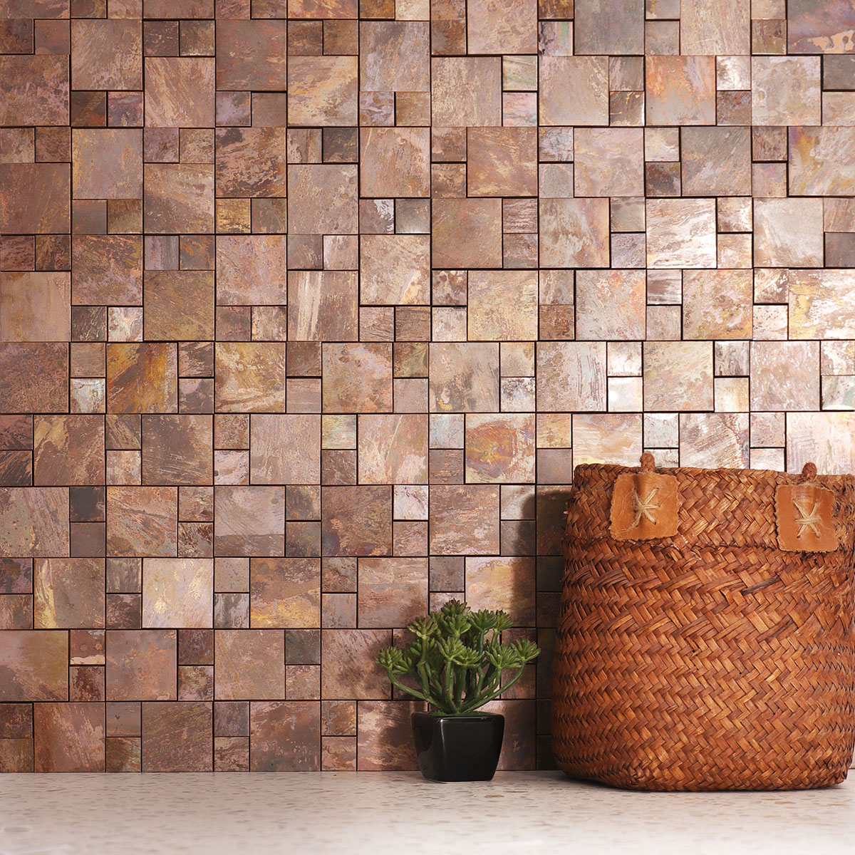 3D copper metallic mosaic tile on a living room wall.