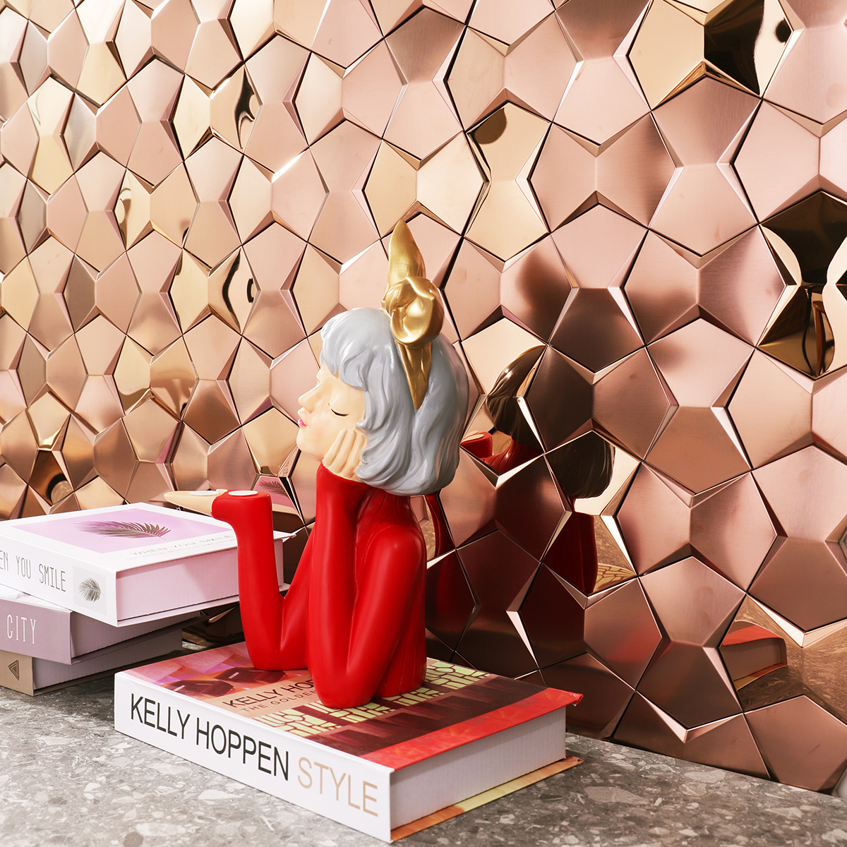 Rose gold 3D metal mosaic tiles adorning a stylish  wall.