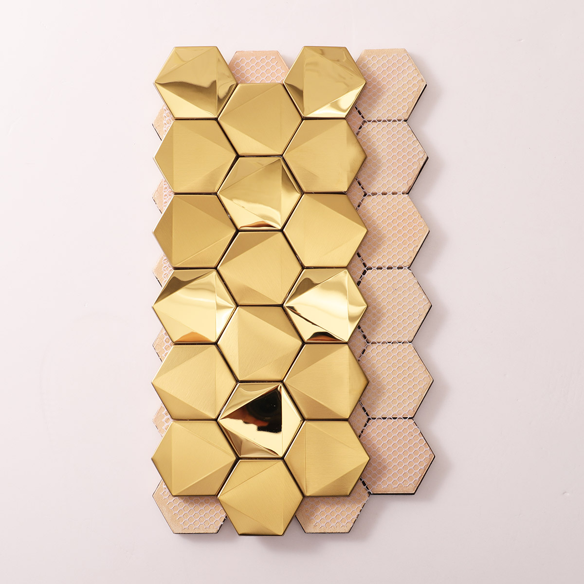 Folded back side of hexagon gold 3D stainless steel mosaic tiles.