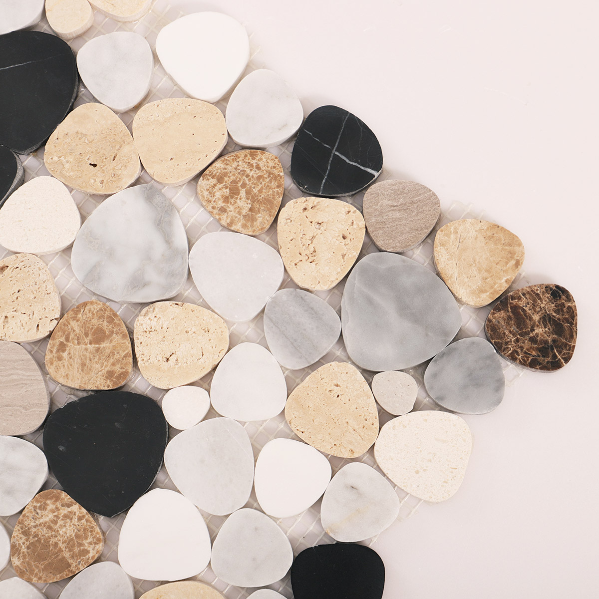 Close-up view of mix pebble marble mosaic tiles