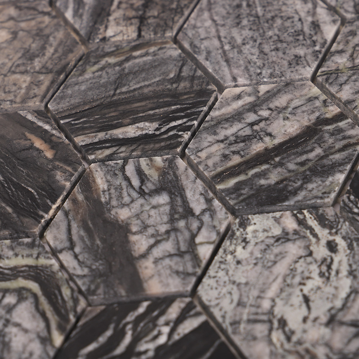 Close-up of dark grey hexagon marble mosaic tiles