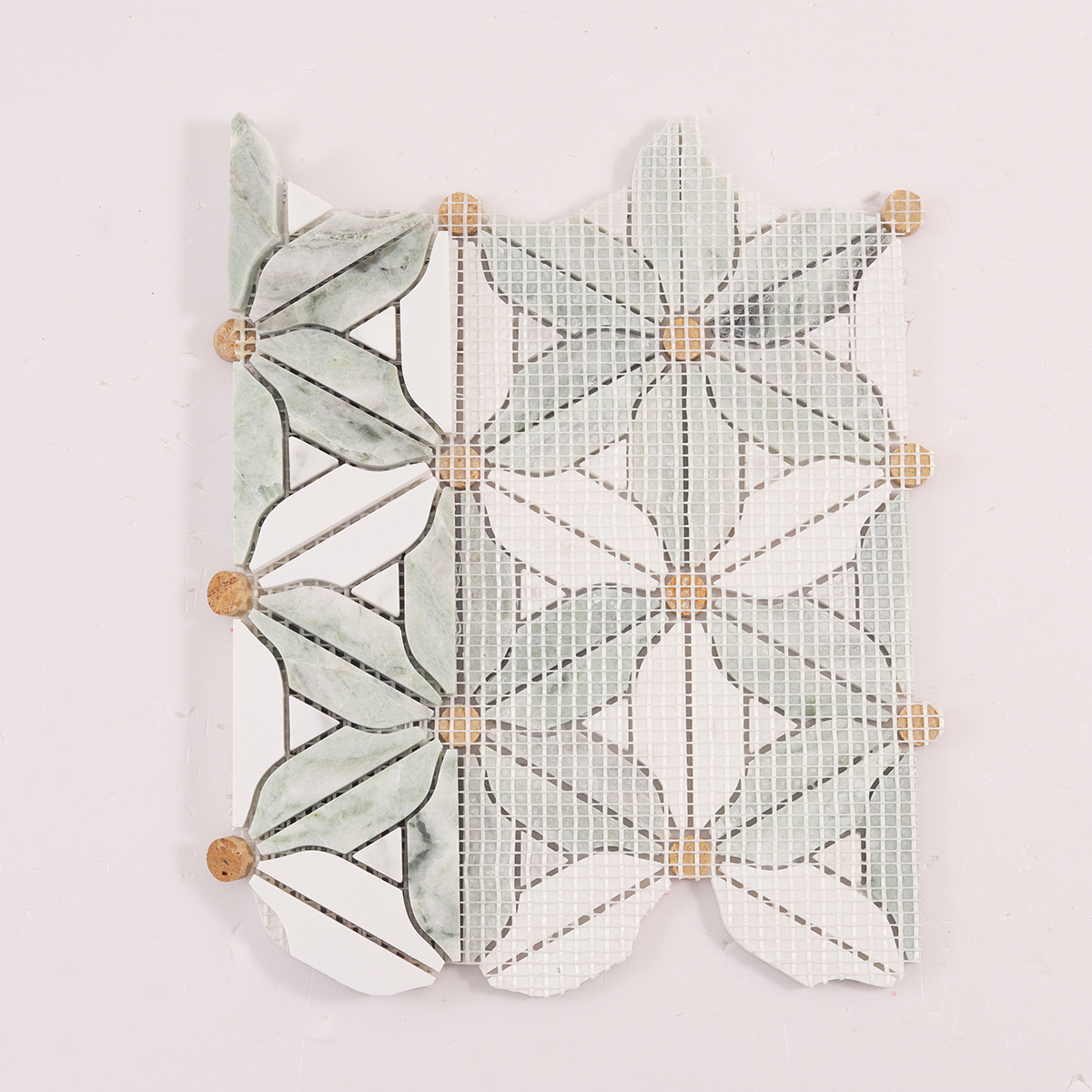 Folded back side of black and white flower marble mosaic tiles.