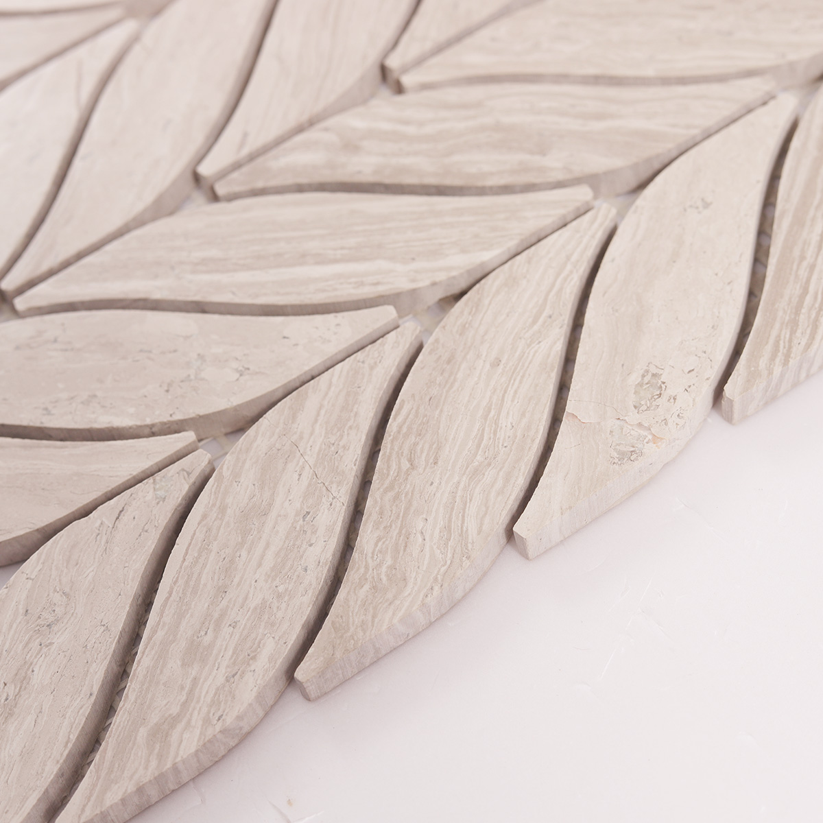 Side close-up view of Grigio Legno leaf shape marble mosaic tiles, showing texture and thickness