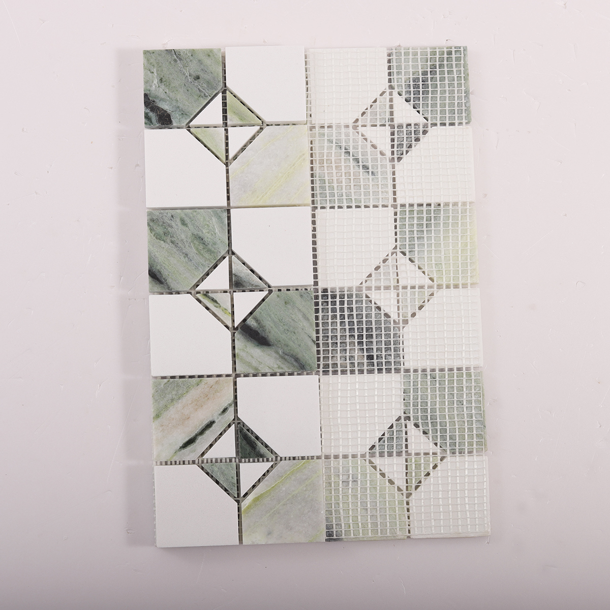 Folded back side of Ming Green & White Marble Honed Mosaic Tiles.