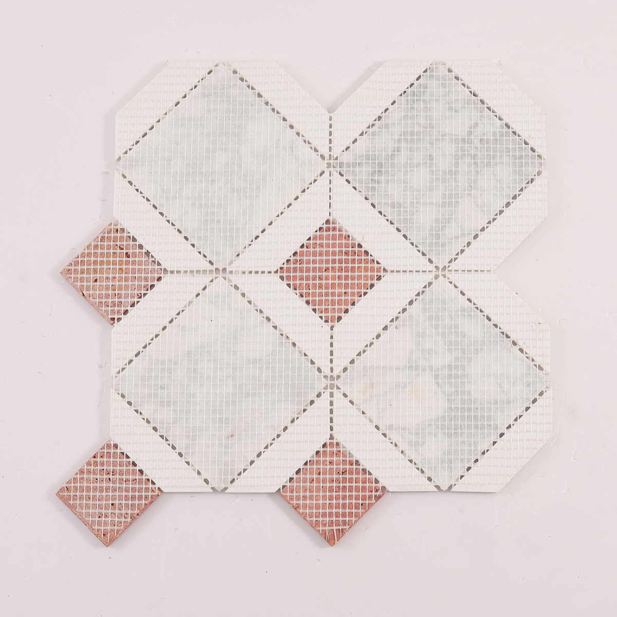 Back side of White and Red Polished Marble Mosaic Tiles, folded.