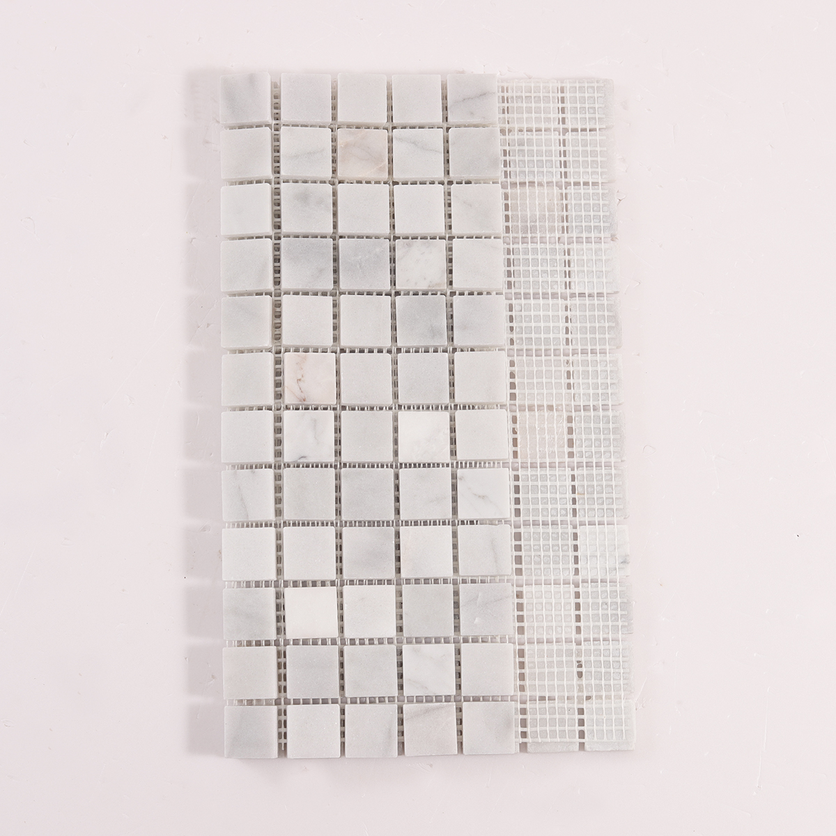 Folded back side of Carrara Venato Square Honed Marble Mosaic Tiles
